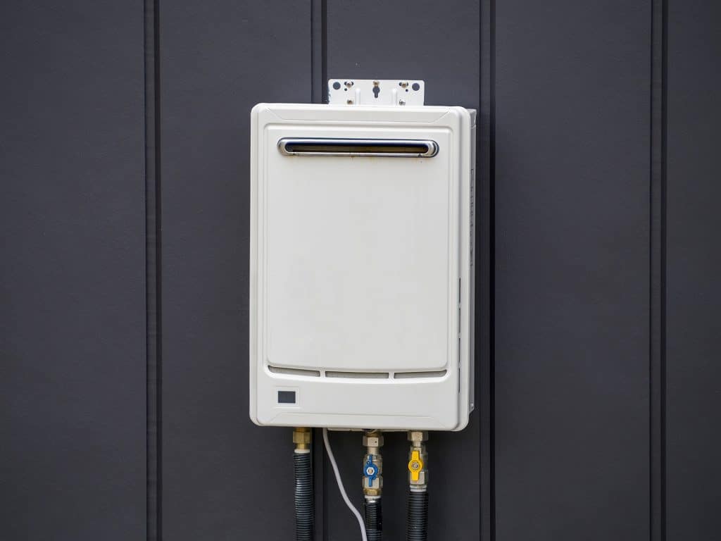 Wall-mounted tankless water heater installation
