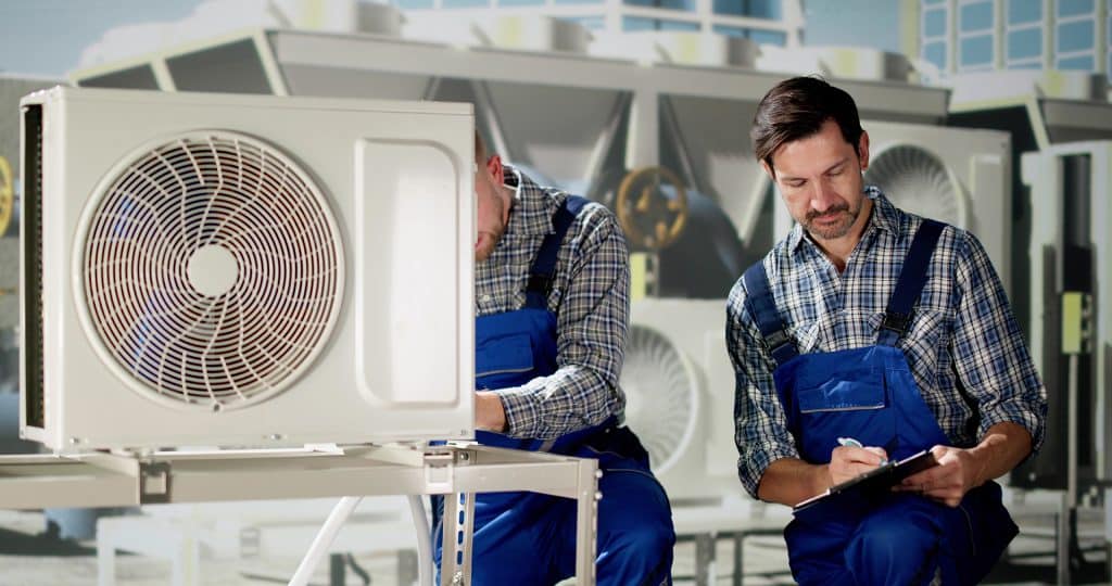 HVAC technician installing new air conditioning unit in Melbourne FL home