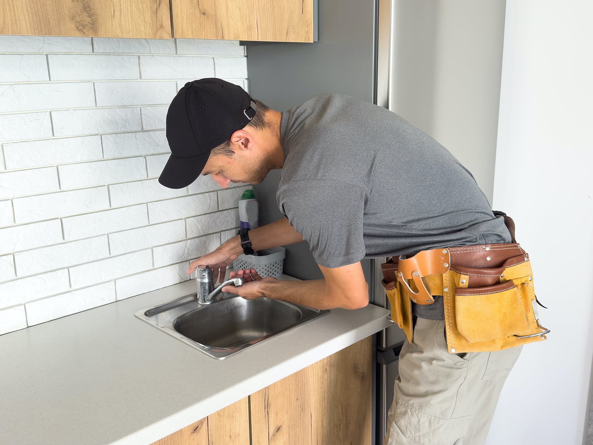 HVAC technician reviewing central AC upgrade equipment for a Florida home